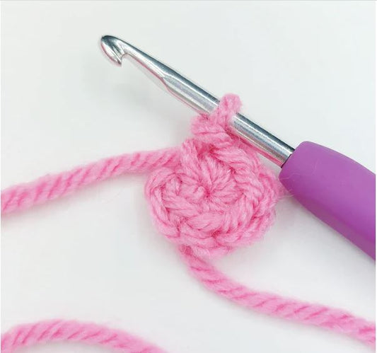 close up of magic circle crochet in process