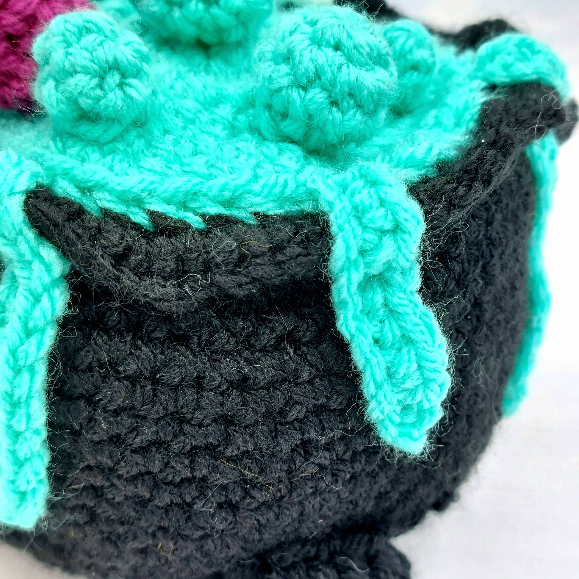 Blue goo in crocet witches cauldron