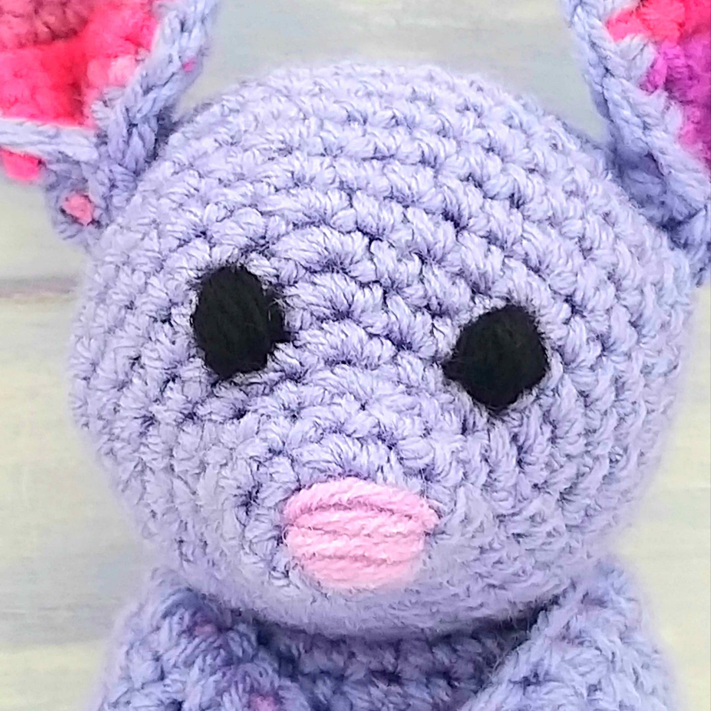Close up of crochet bats eyes and nose