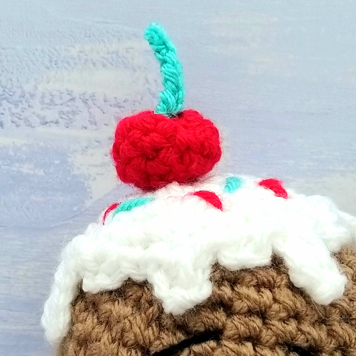 Cherry on Gingerbread Man's head