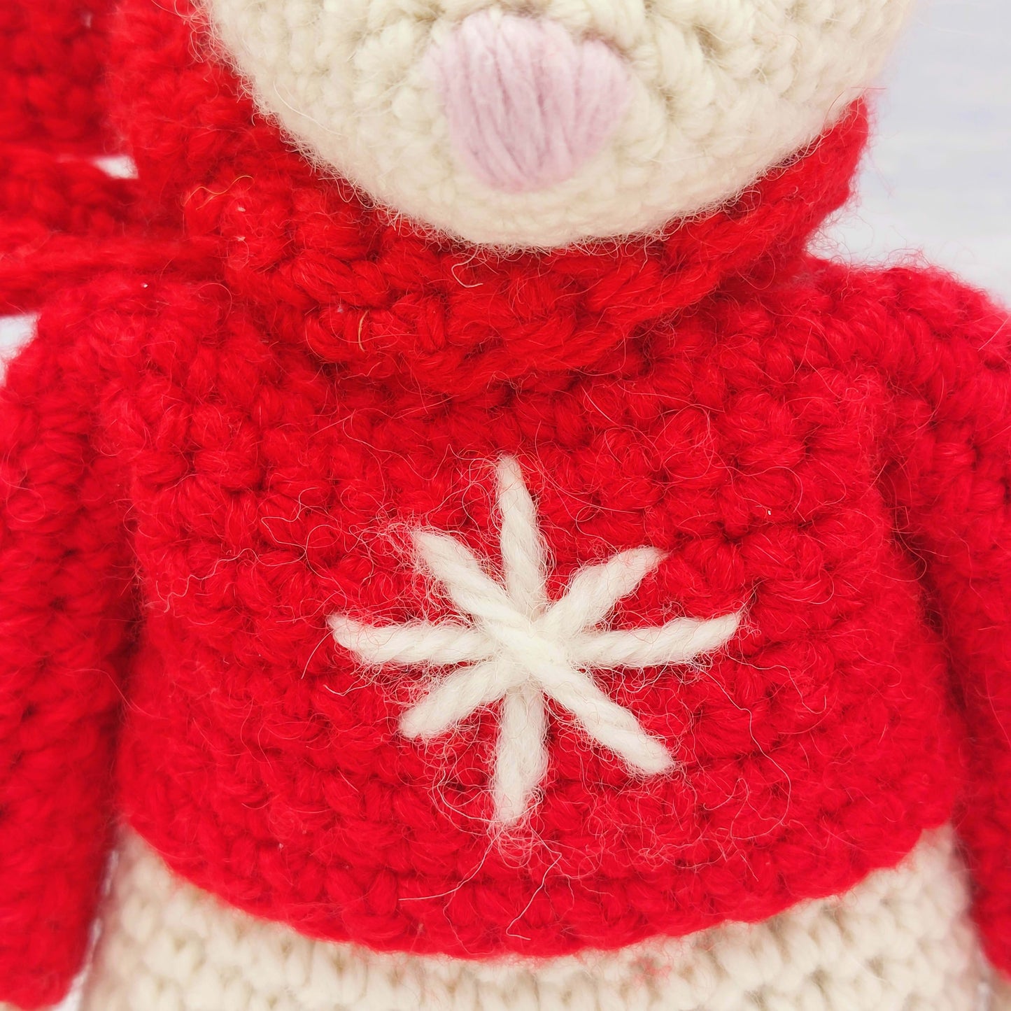 Close up of detail on crochet mouse's jumper