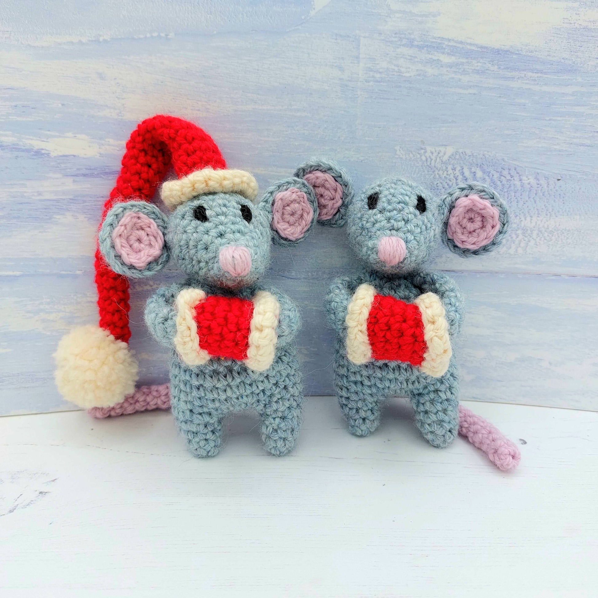 Two grey christmas crochet mice