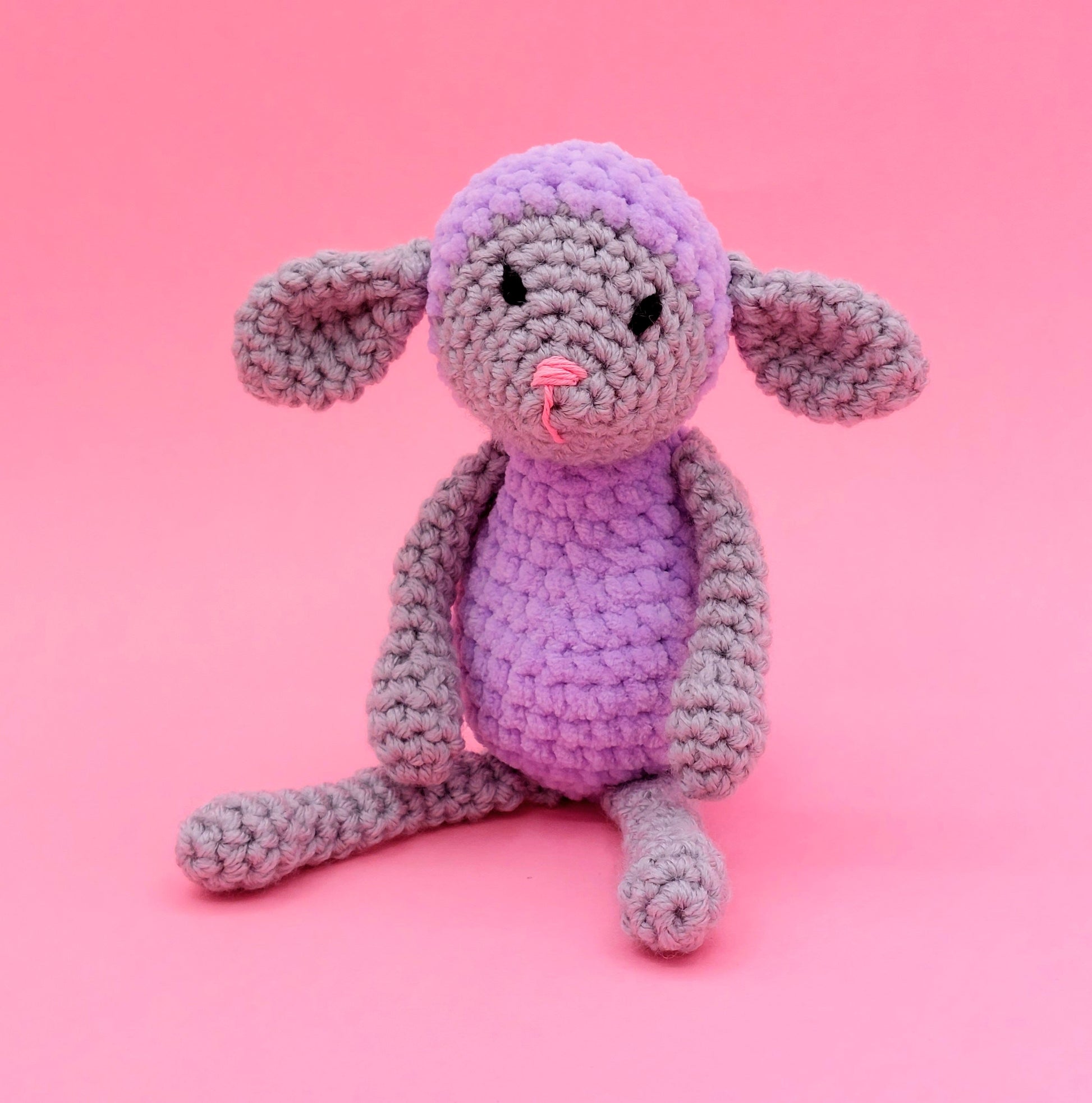 Lamb with lilac clothes