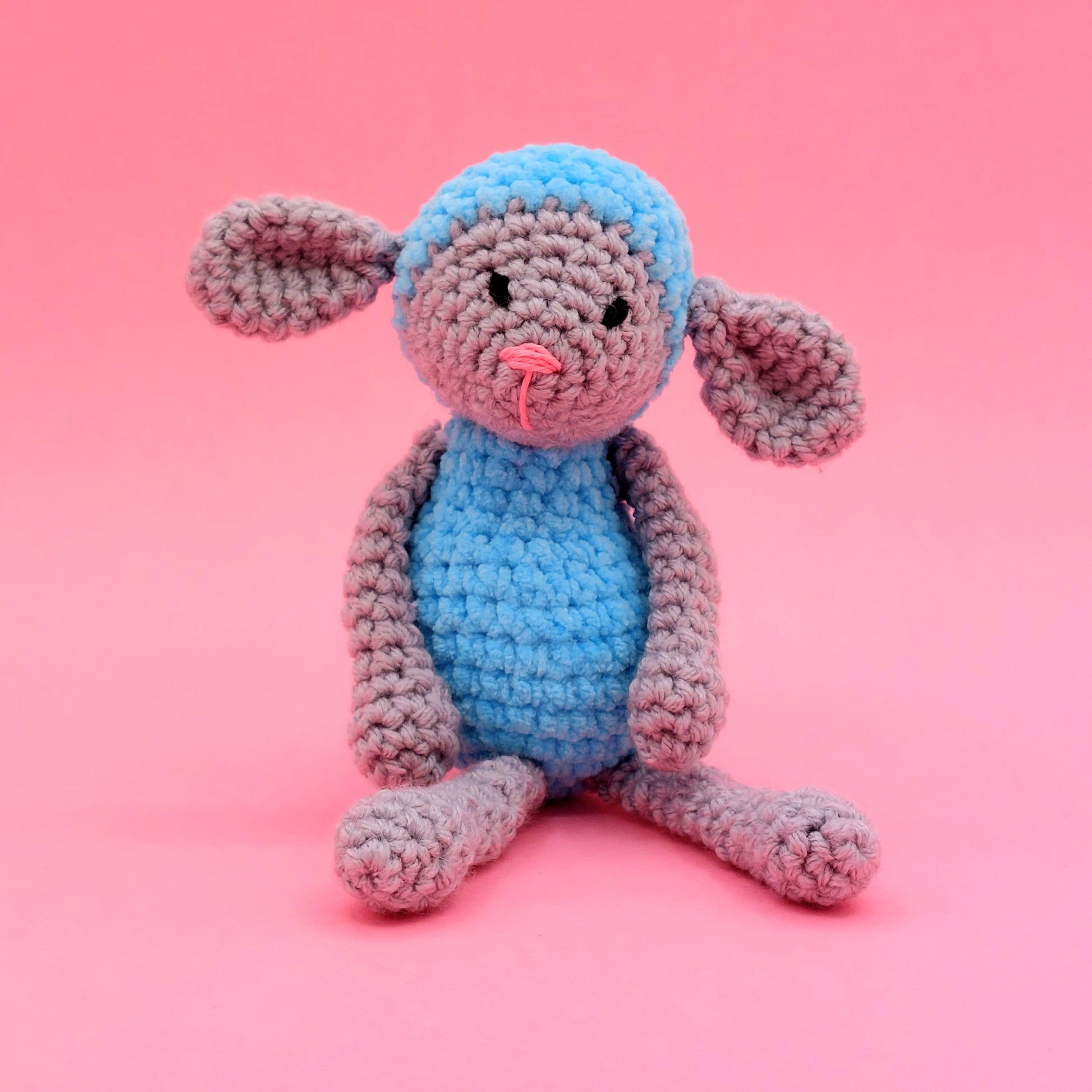 Lamb with sky blue clothes