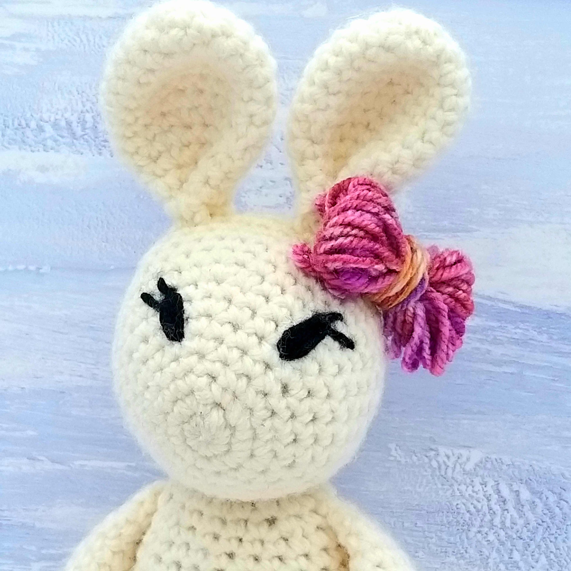 Close up of crochet rabbit's hairbow