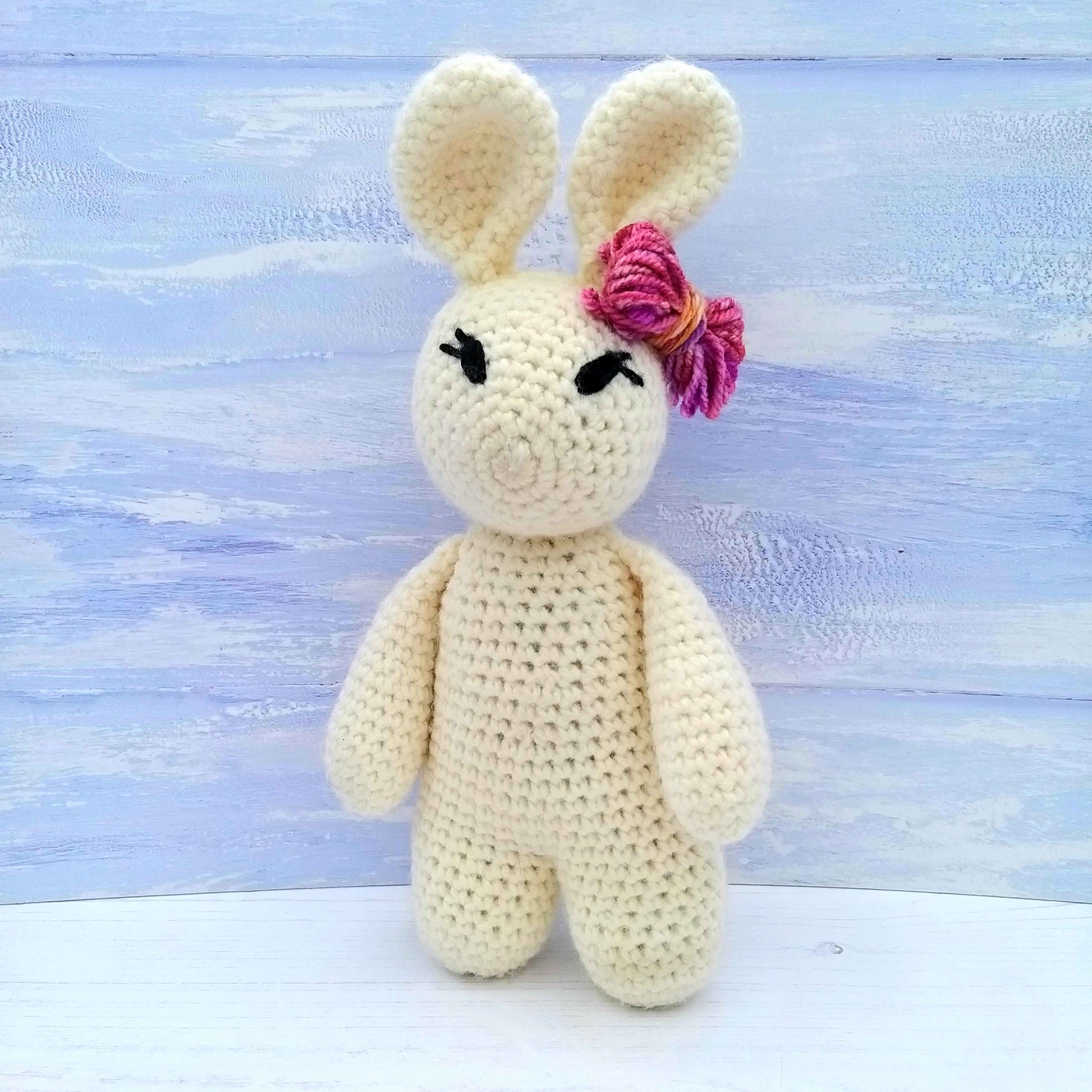 Cream crochet rabbit with pink bow