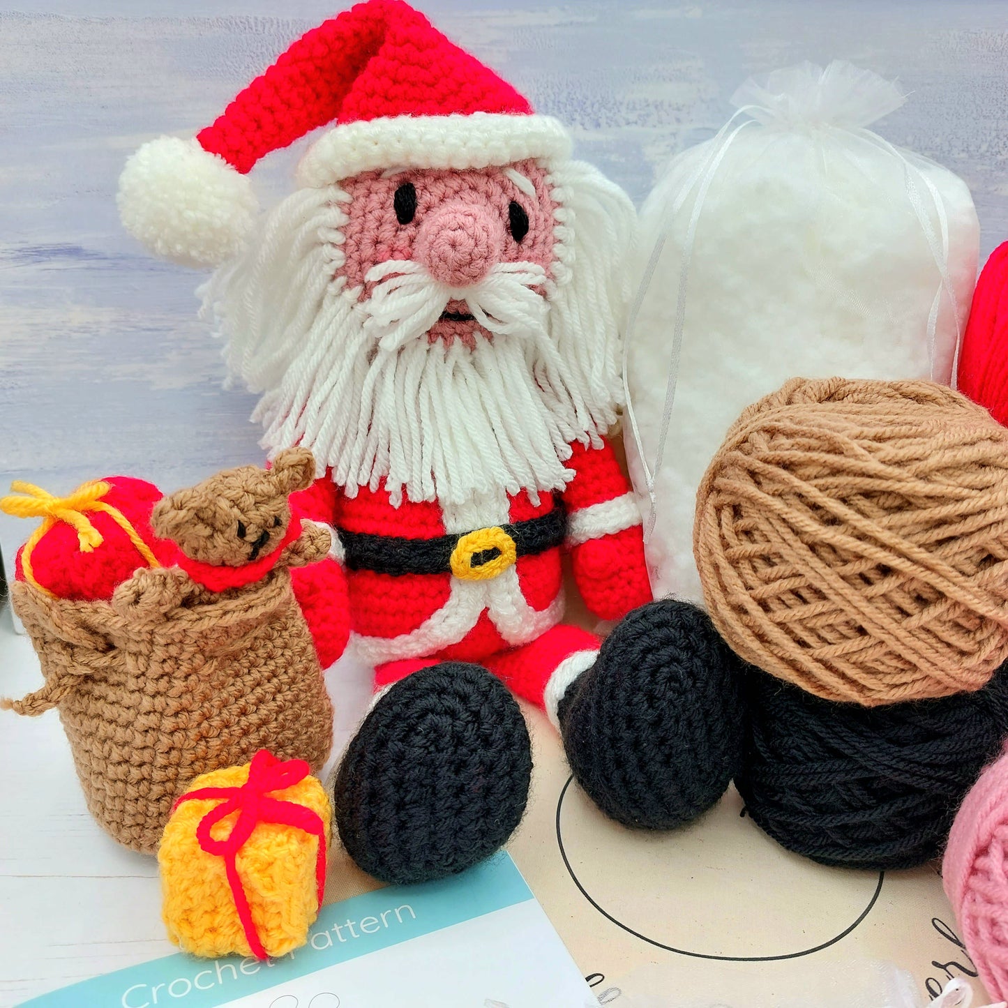 Balls of wool used for crochet Santa