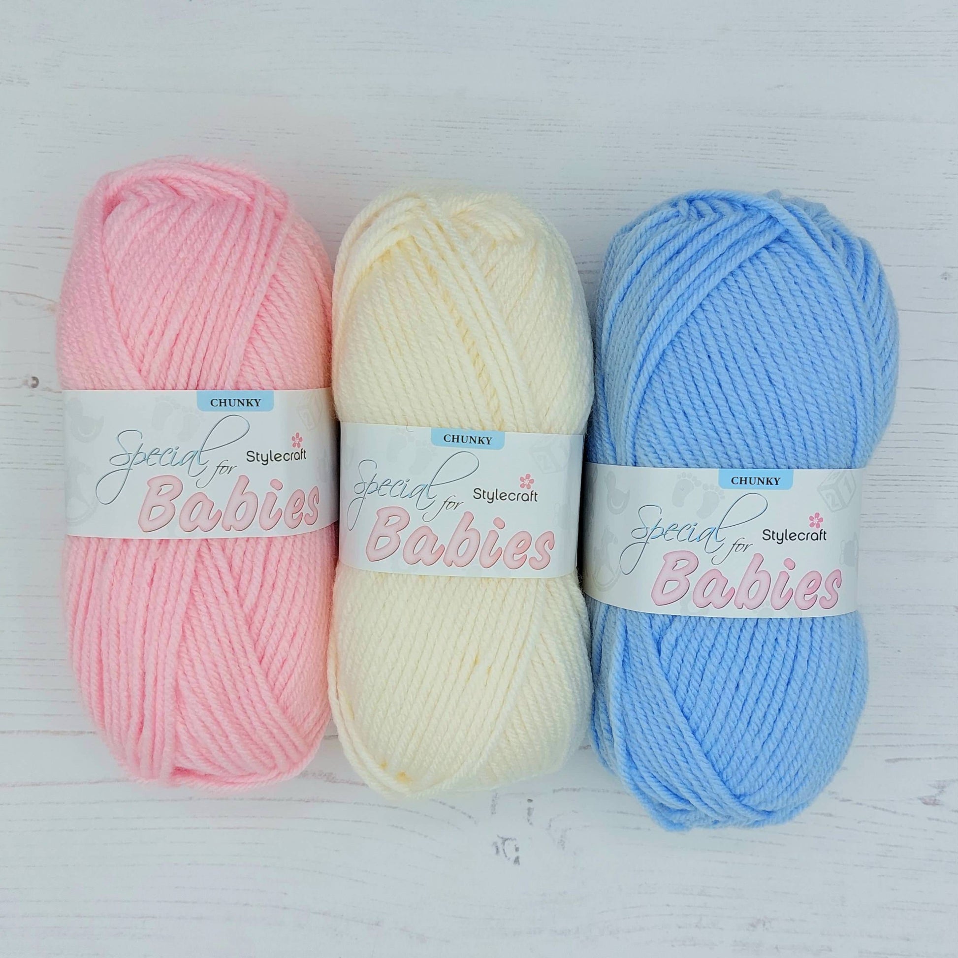 Balls of wool - pink, cream and blue
