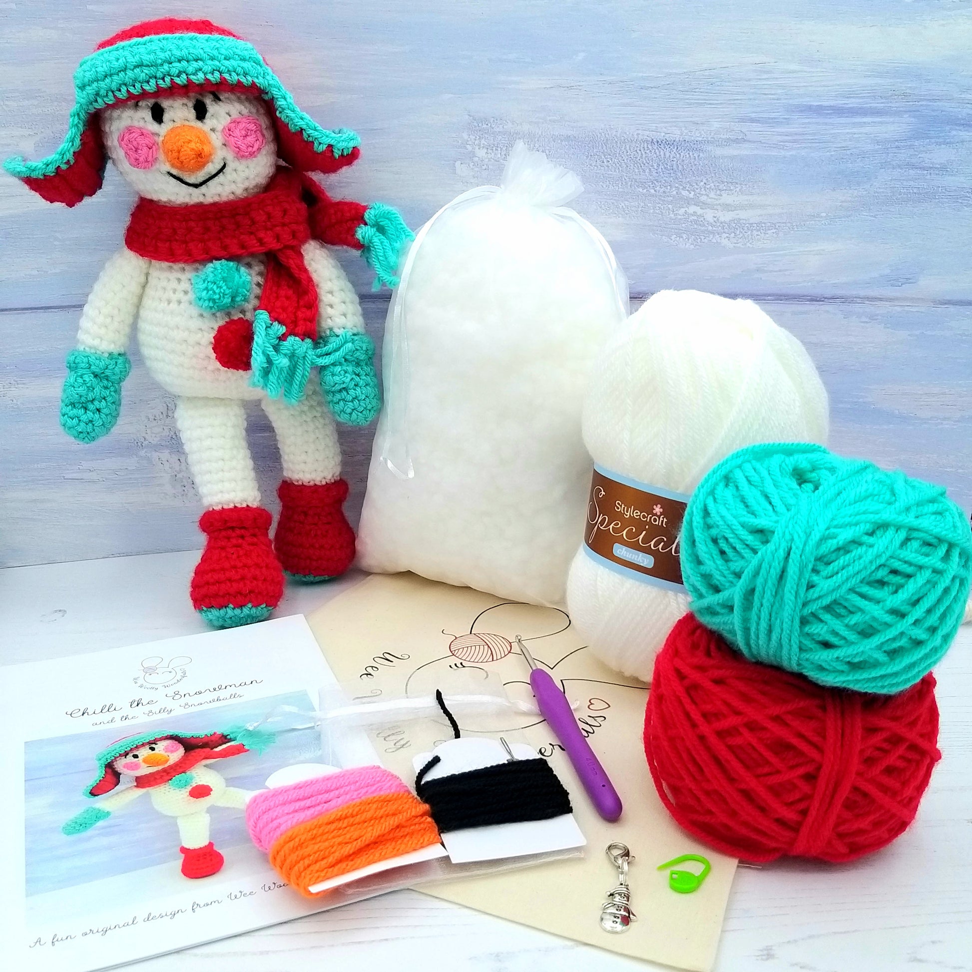 Contents of Snowman Crochet Kit - Wool, Pattern and project bag