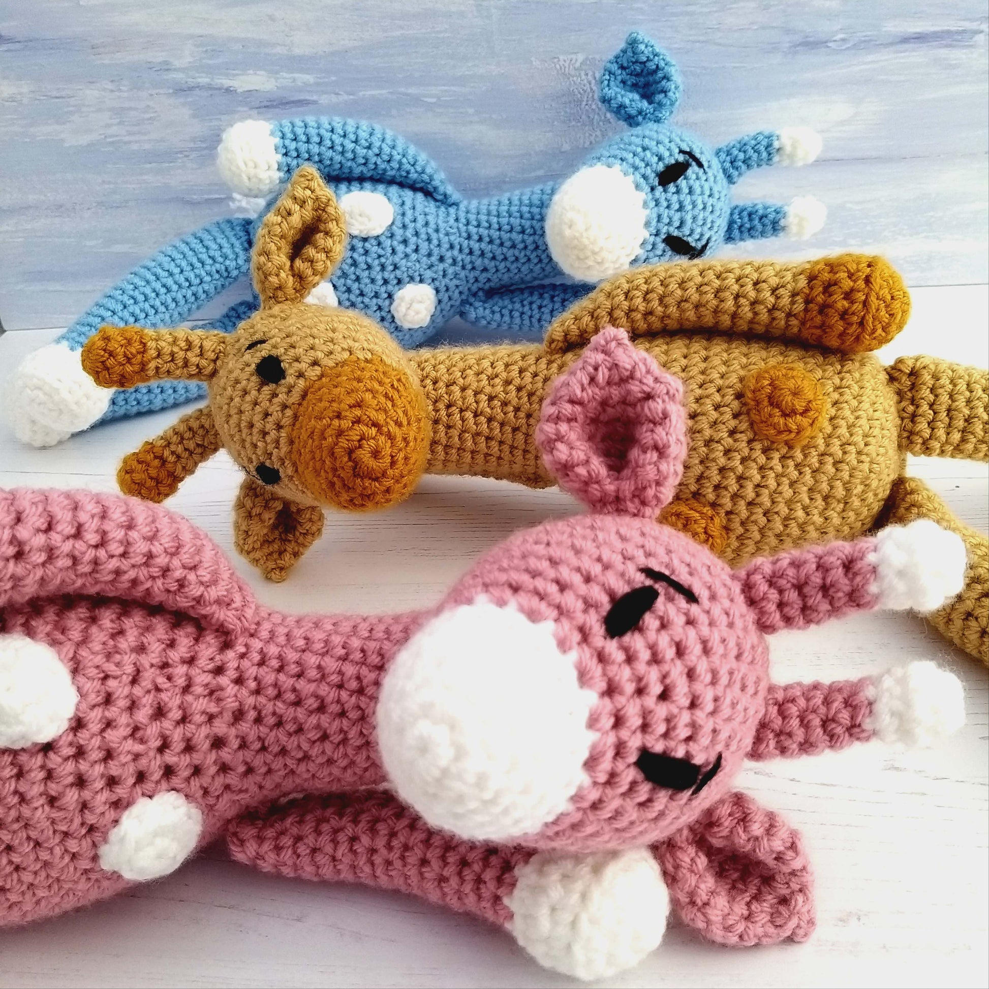 Toy Giraffe Crochet Kit for Beginners - finished giraffe toys in pink, yellow and blue